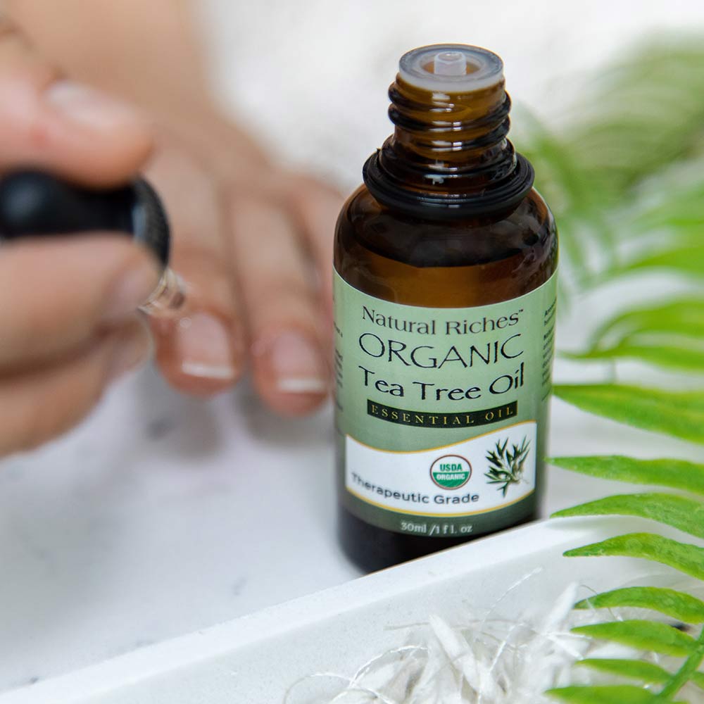 applying USDA Organic Tea Tree Essential Oil for nail defects