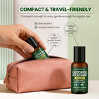 Bottle of castor oil with rosemary roll on held by a hand above a pink pouch, with text highlighting features.