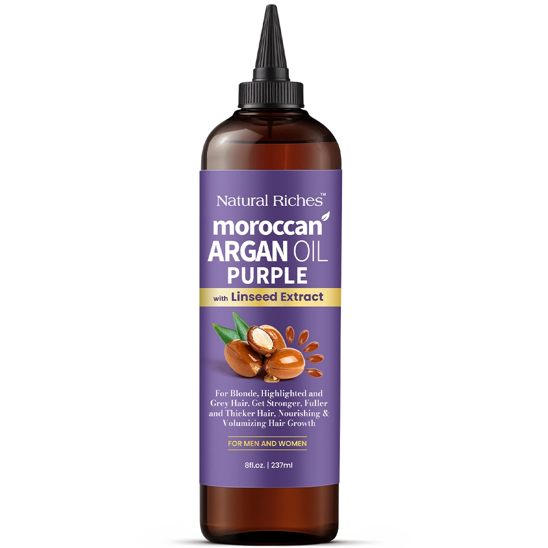 Bottle of Natural Riches Moroccan Argan Oil Purple with Linseed Extract on a white background
