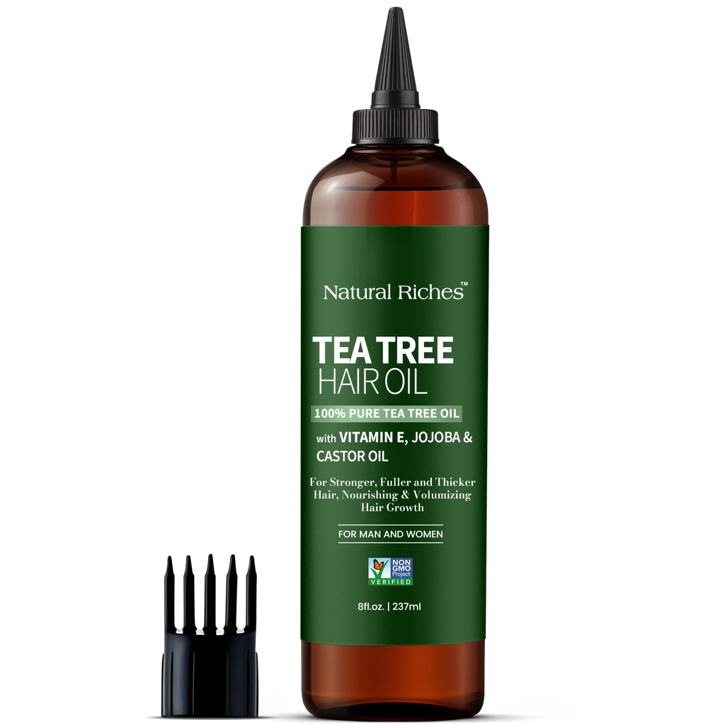 Tea tree hair oil bottle with green label and brown glass container on a white background