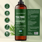 Bottle of Natural Riches Tea Tree Hair Oil with green label and brown bottle on a beige background